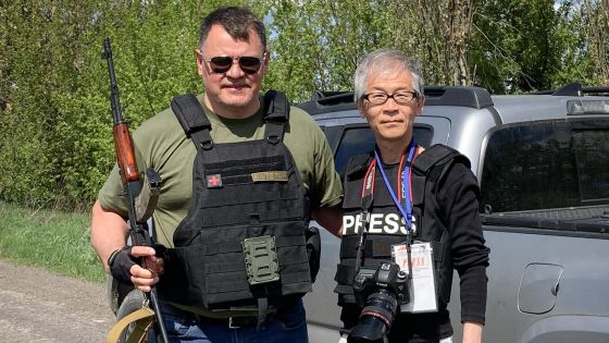 image:Image Pastor Mochněnko s novokřtěncem – japonským reportérem Takašim.